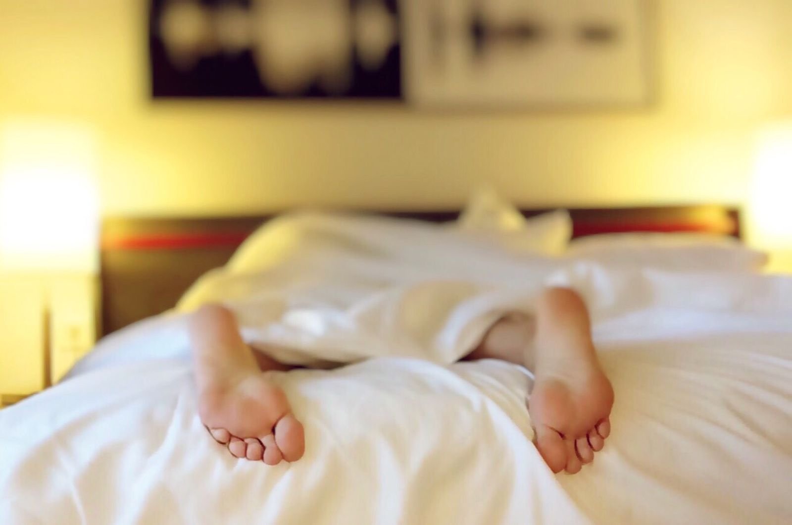 Memory foam mattress on a clean white bed in a modern bedroom